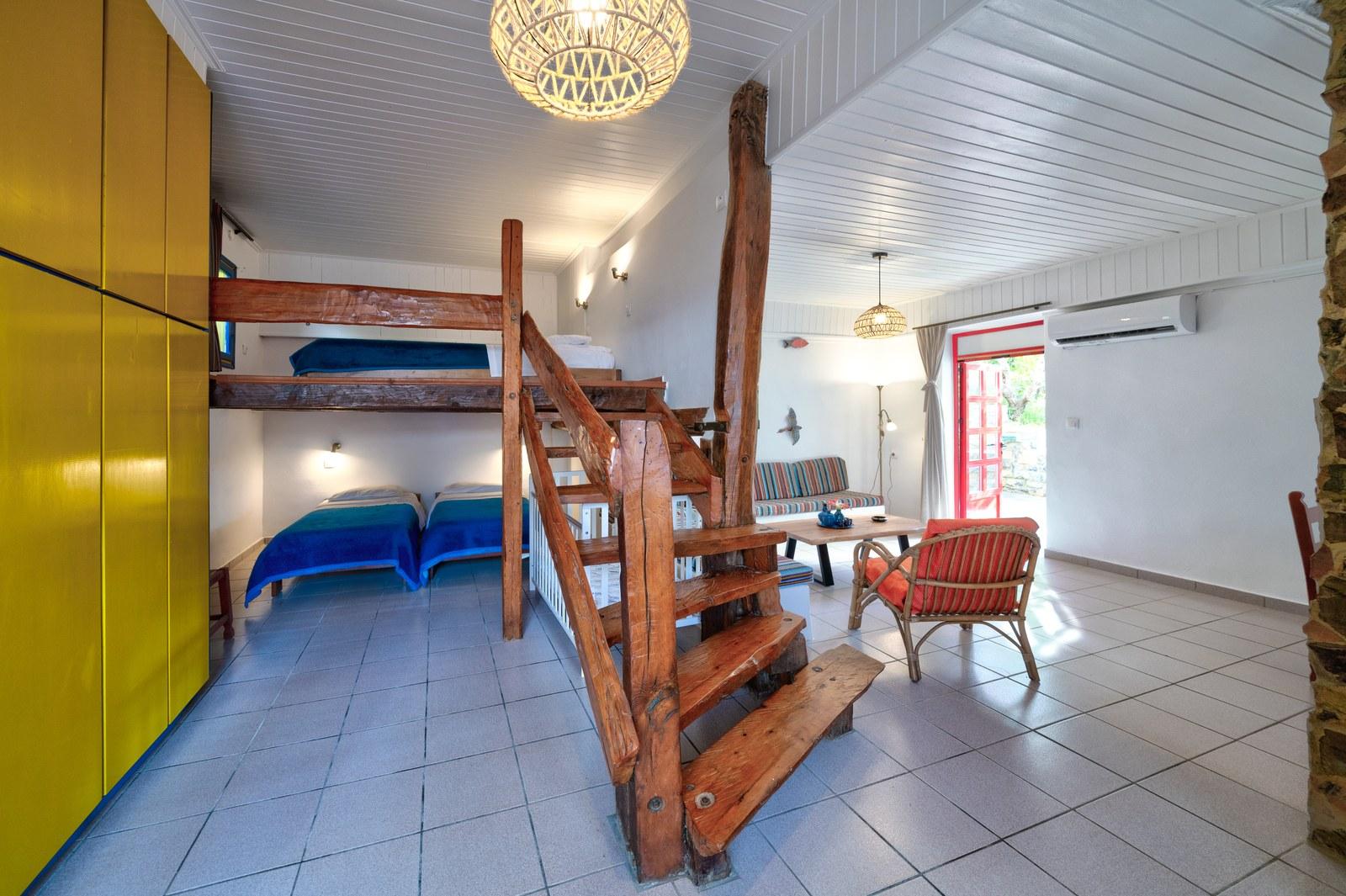 Inside garden apartment two, with its timber half-floor