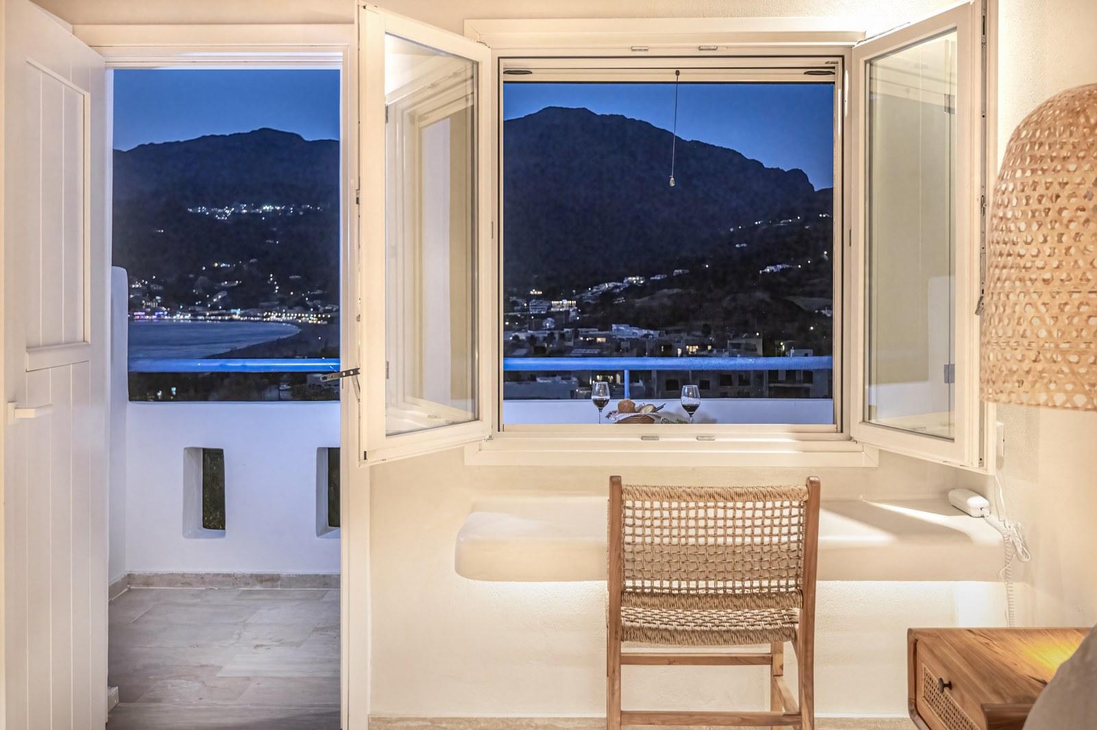 A renovated room at Plakias Bay under its bamboo ceiling